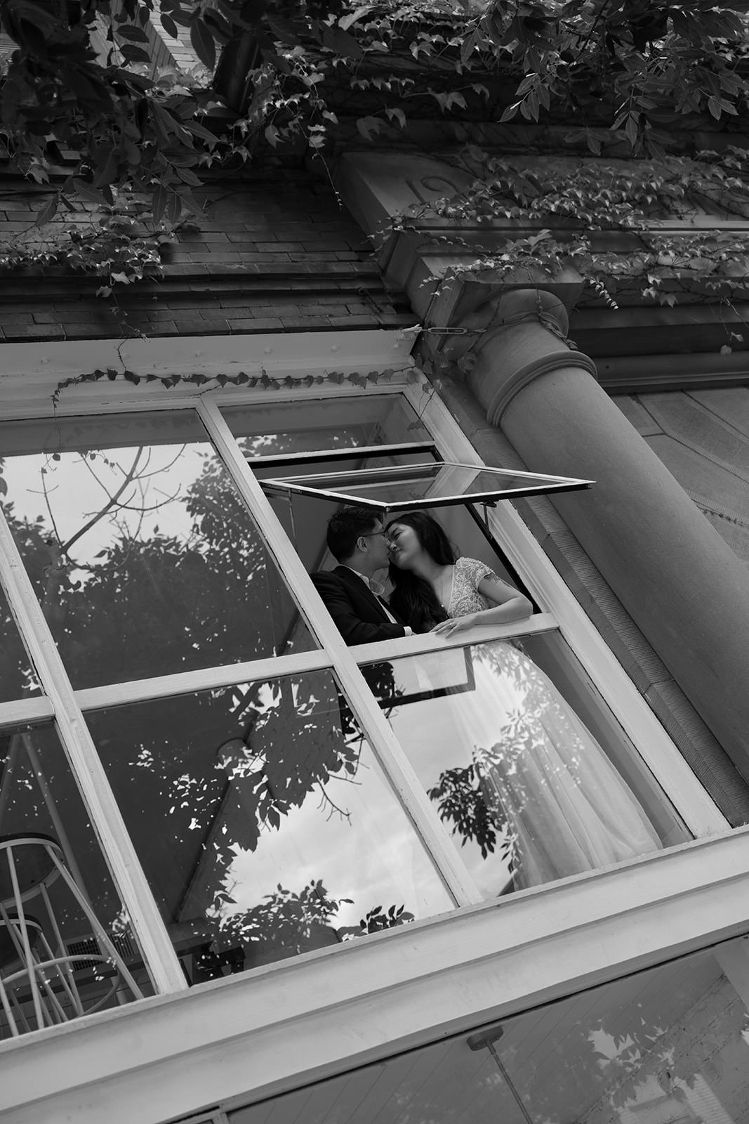 bride and groom on observation desk in hoyt arboretum