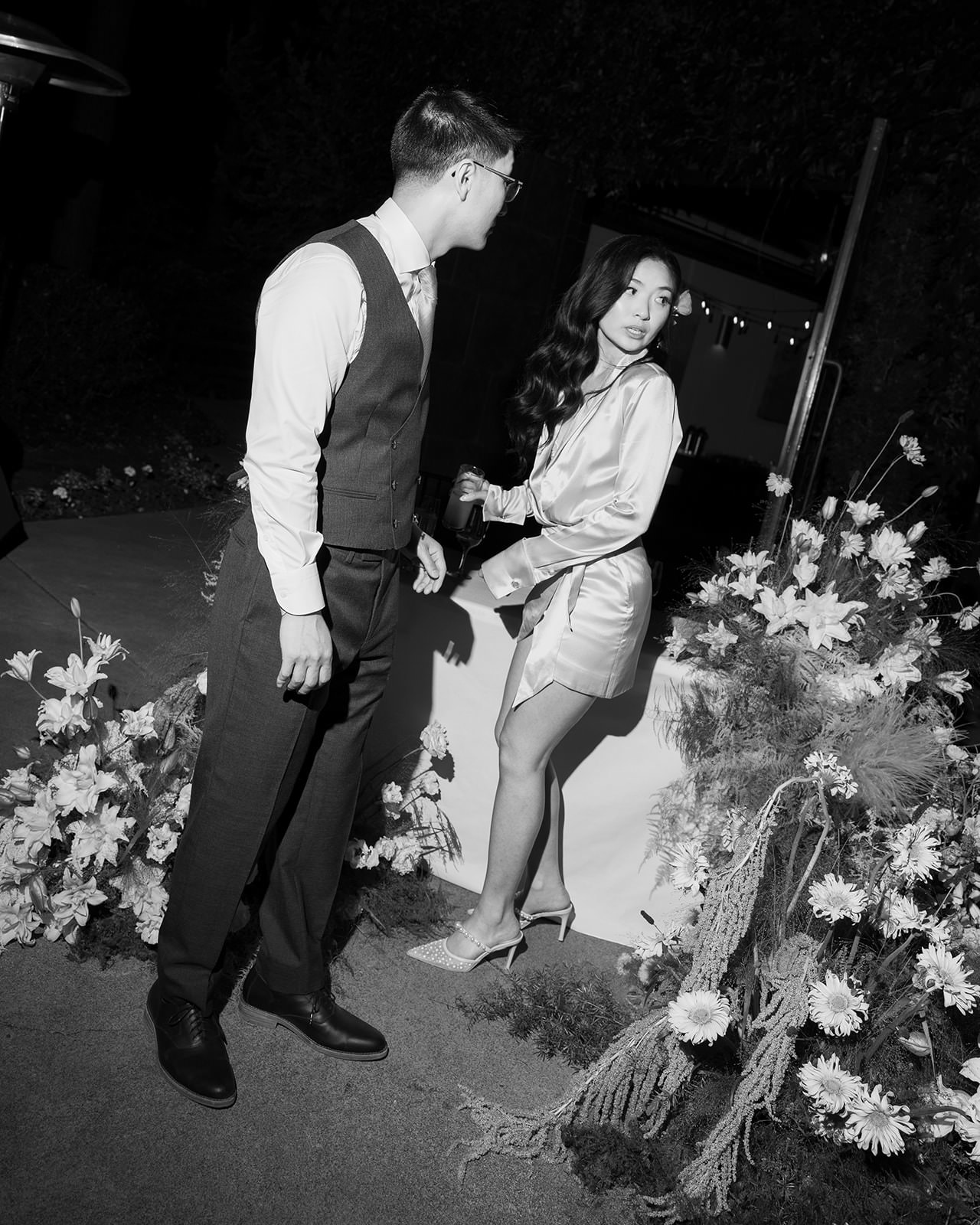 bride with florals moody reception lighting JM Cellars Washington, cinematic editorial wedding<br />
photography